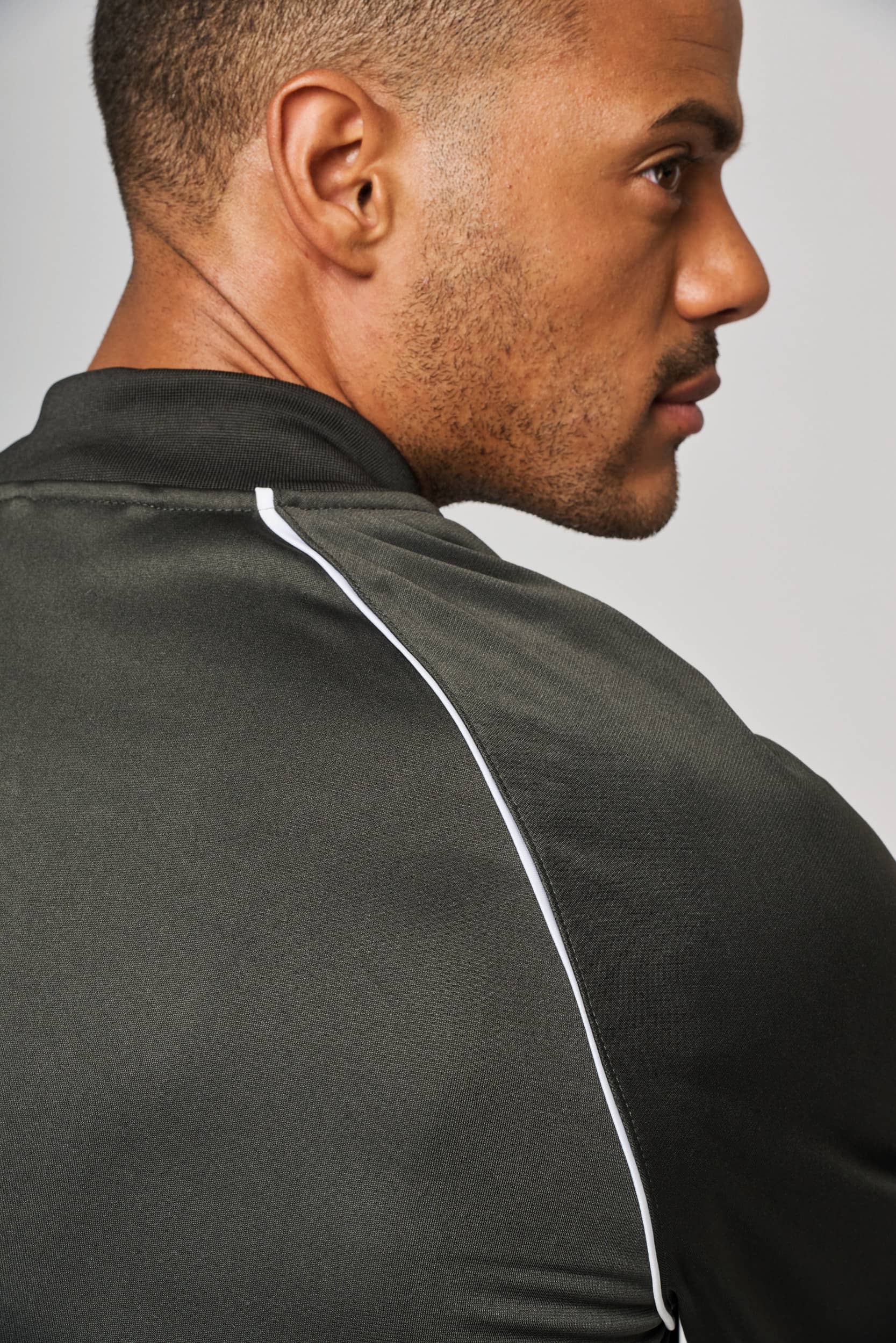 Unisex-Trainingsjacke mit Reißverschluss und Paspel