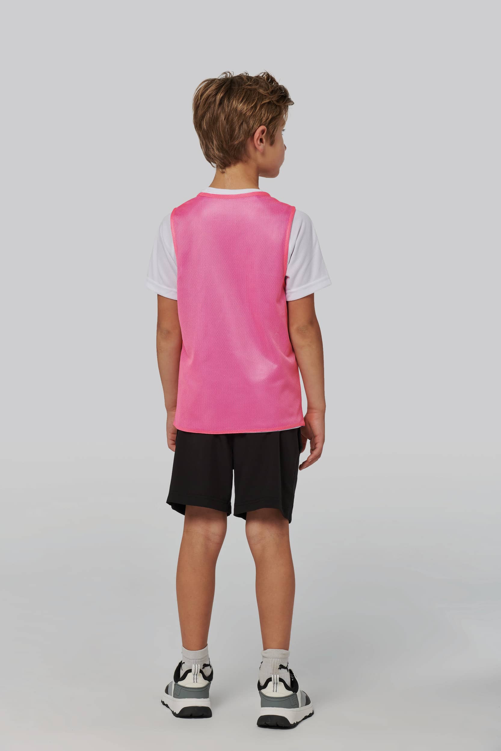 Beidseitig tragbares Multisport-Leibchen für Kinder